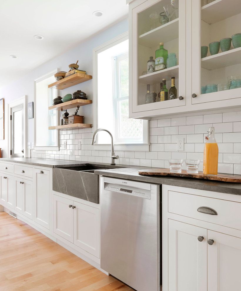 Vermont Soapstone for a Farmhouse Kitchen with a Modern Farmhouse and Stowe Remodel by Peregrine Design Build