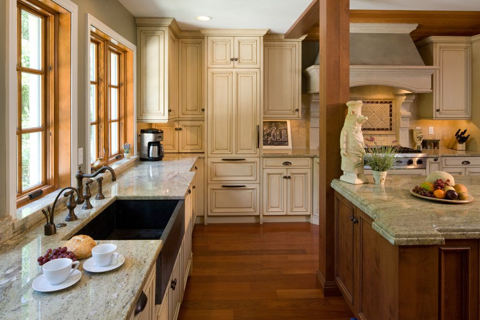 Vermont Soapstone for a Mediterranean Kitchen with a Granite Counter and Ruxton Kitchen by Hbf Plus Design