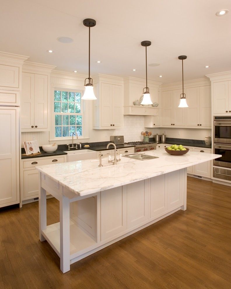 Vermont Soapstone for a Traditional Kitchen with a Glass Pendants and Princeton Restoration by Dennison and Dampier Interior Design