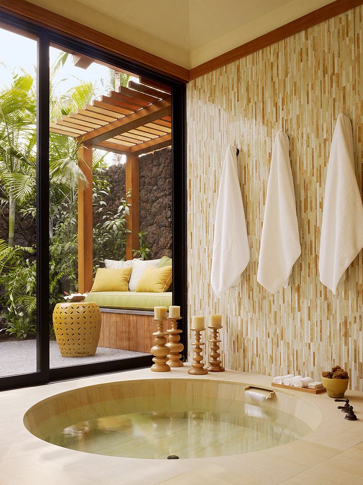 Vertical Bathtub for a Tropical Bathroom with a Patio and Kanae Lot 1 by Gm Construction, Inc.