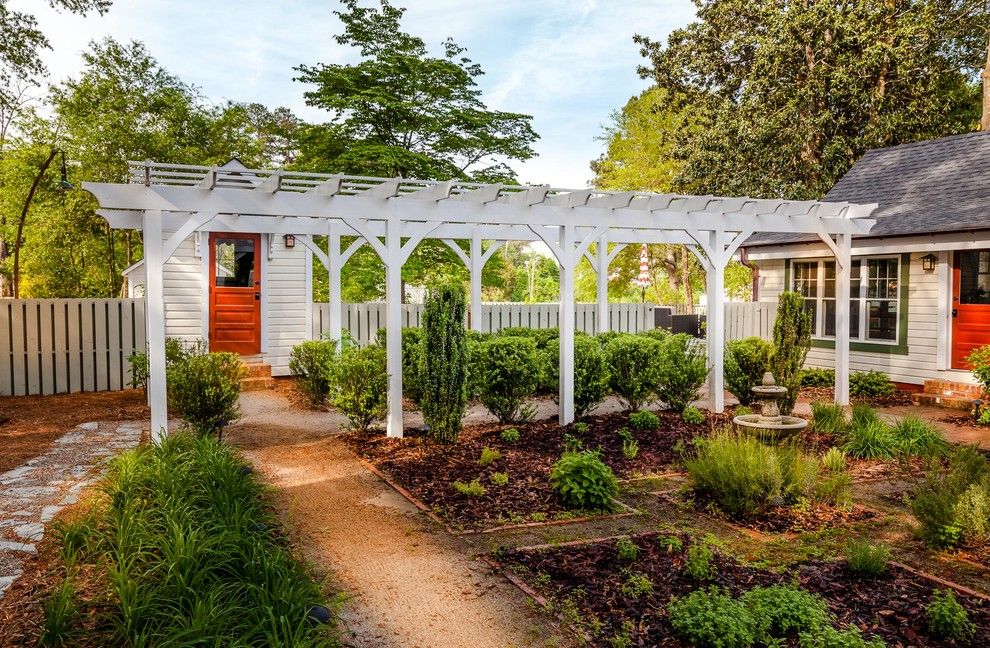 Vrbo Rosemary Beach for a Farmhouse Landscape with a Red Door and Kitchen Renovation by Dandeneau Architecture P.l.l.c.