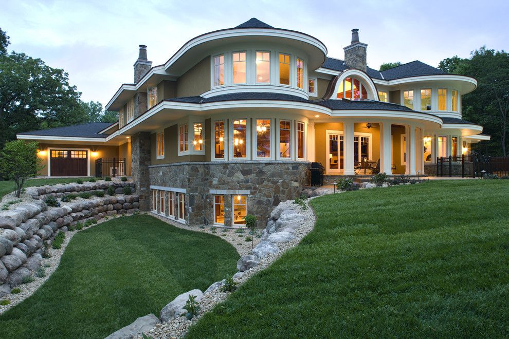 Walkout Basement for a Beach Style Exterior with a Beach Style and Lakeside Exterior by John Kraemer & Sons