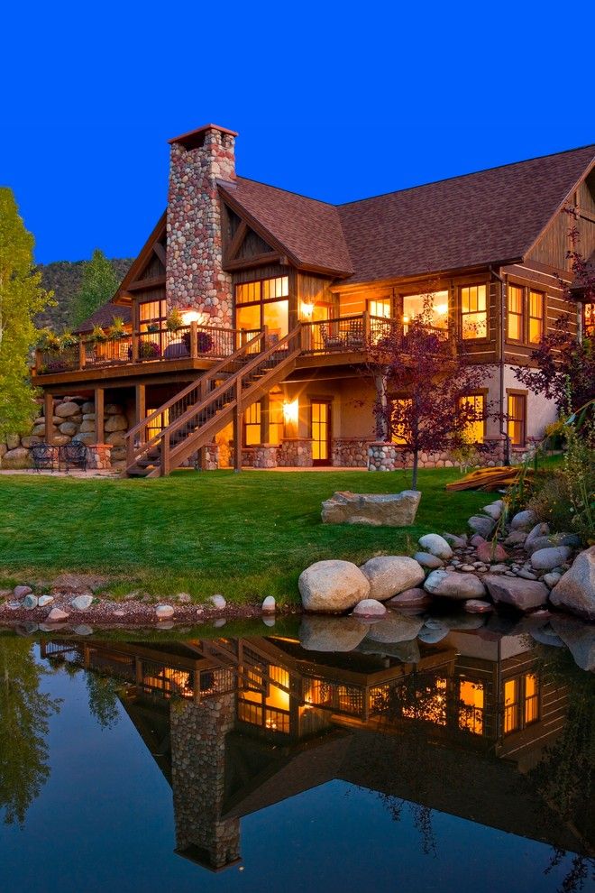 Walkout Basement for a Rustic Exterior with a Mountain Home and Colorado Mountain Home by Environmental Dynamics, Inc.