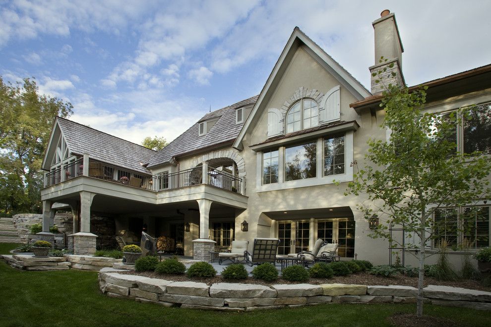 Walkout Basement for a Traditional Exterior with a Stone and Traditional Exterior by Murphycodesign.com