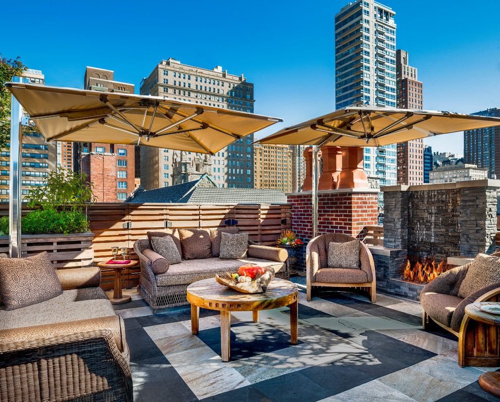 Walters Wicker for a Traditional Deck with a Outdoor Fireplaces and Rooftop Entertaining by Eberlein Design Consultants Ltd.