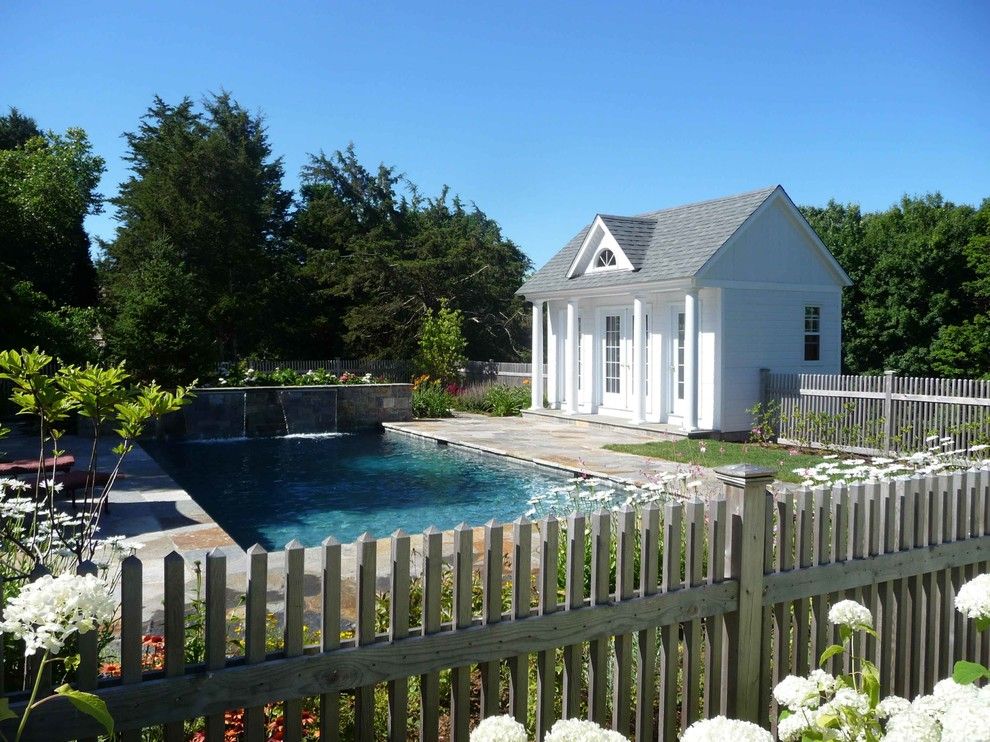 Water Spicket for a Traditional Pool with a Landscape and North Madison Residence by Christensen Landscape Services