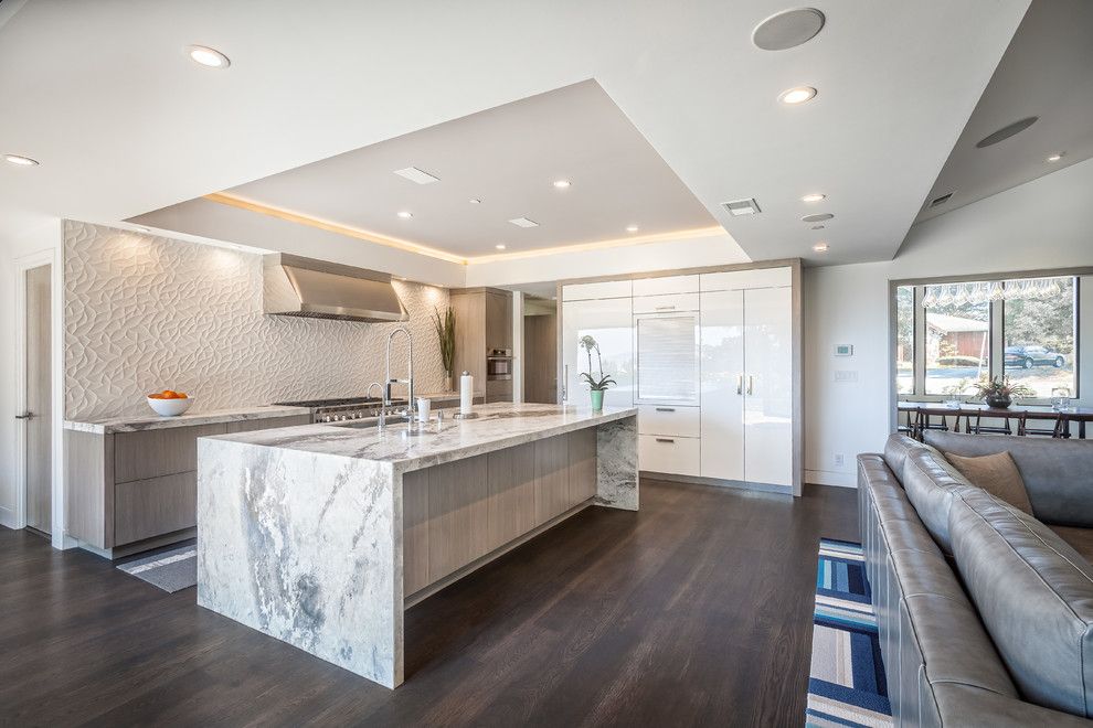 Waterfall Countertop for a Contemporary Kitchen with a Tray Ceiling and Hillsborough 2 by A.v. Builders Inc.