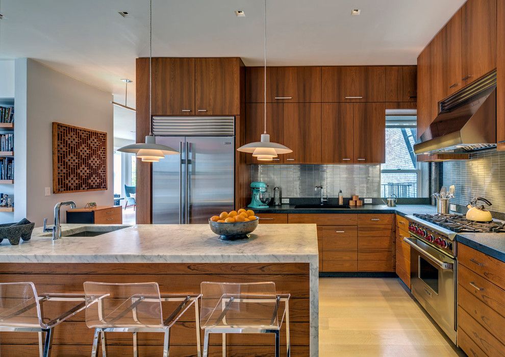 Waterfall Countertop for a Midcentury Kitchen with a Cake Mixer and Midcentury Kitchen by Aboveconstruction.com