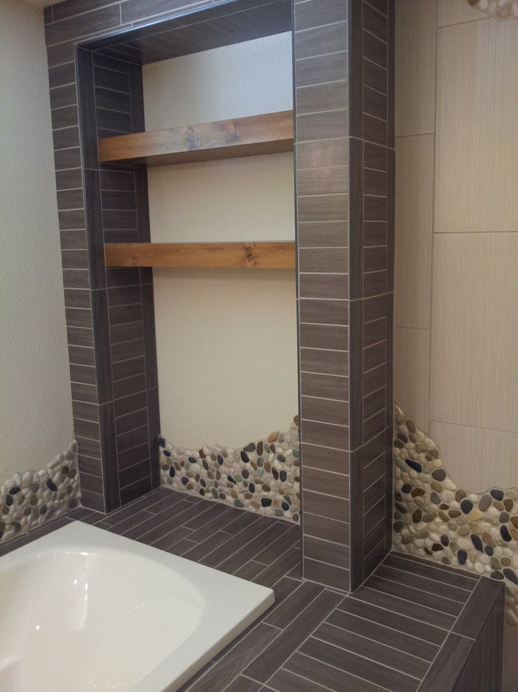 Wausau Tile for a Rustic Bathroom with a Bath Tub and Hazelhurst Renovation by Floorology