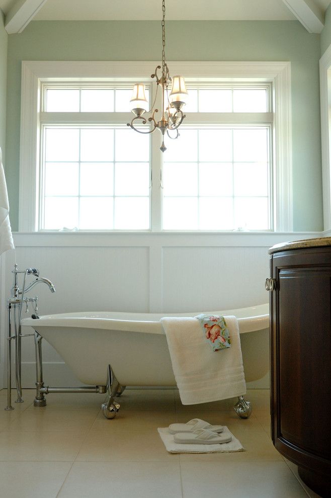 Waynes Coating for a Traditional Bathroom with a Chandelier and Owner's Bath by Echelon Custom Homes