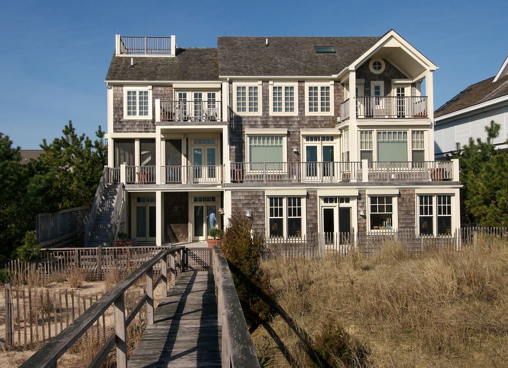 Weathered Wood Shingles for a Traditional Exterior with a Shingle Siding and Boardwalk Builders by Boardwalk Builders