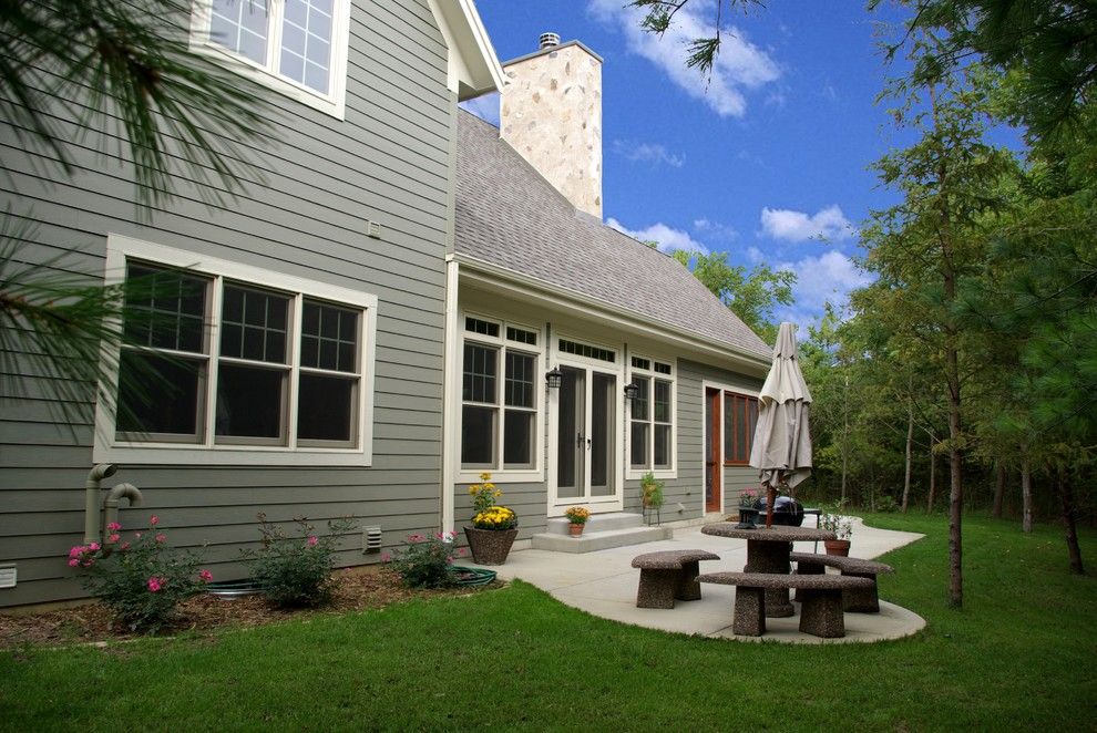 Weathered Wood Shingles for a Traditional Patio with a Patio Seating and Gravel Residence by Highland Builders Llc