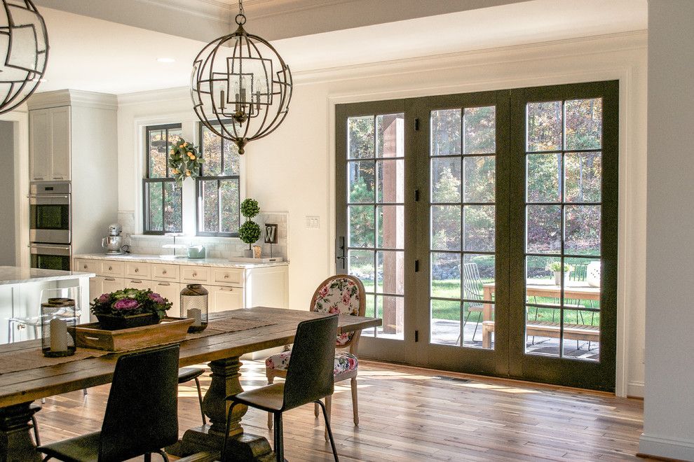 Weathershield Windows for a  Spaces with a White Kitchen and Bedwyn Kitchen by Jtwdesign Llc