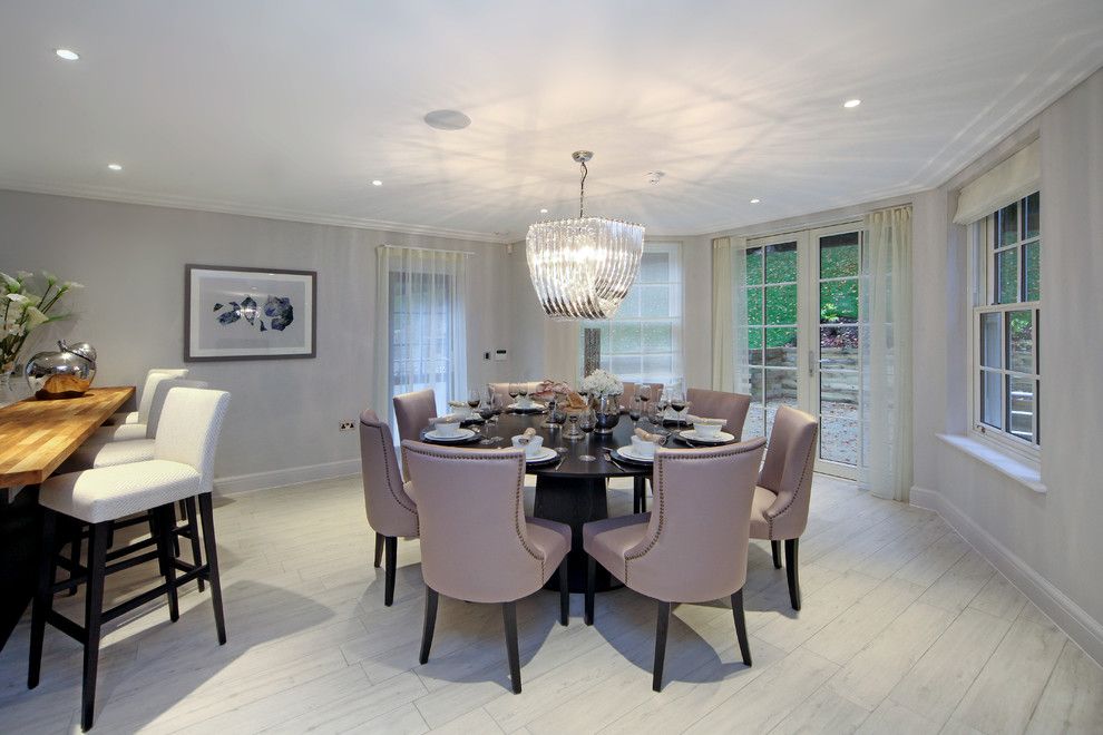 Westfield Lighting for a Transitional Dining Room with a Black Round Dining Table and Westfield House by Micasa