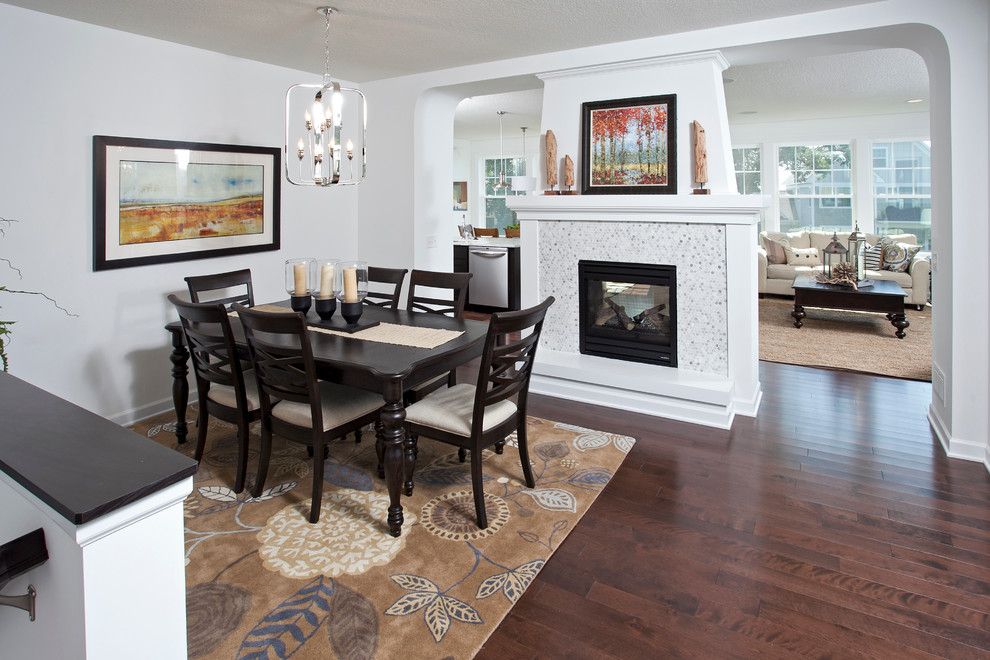 Westfield Lighting for a Transitional Dining Room with a Center Fireplace and the Westfield   Fall 2013 Parade of Homes Model by Homes by Tradition