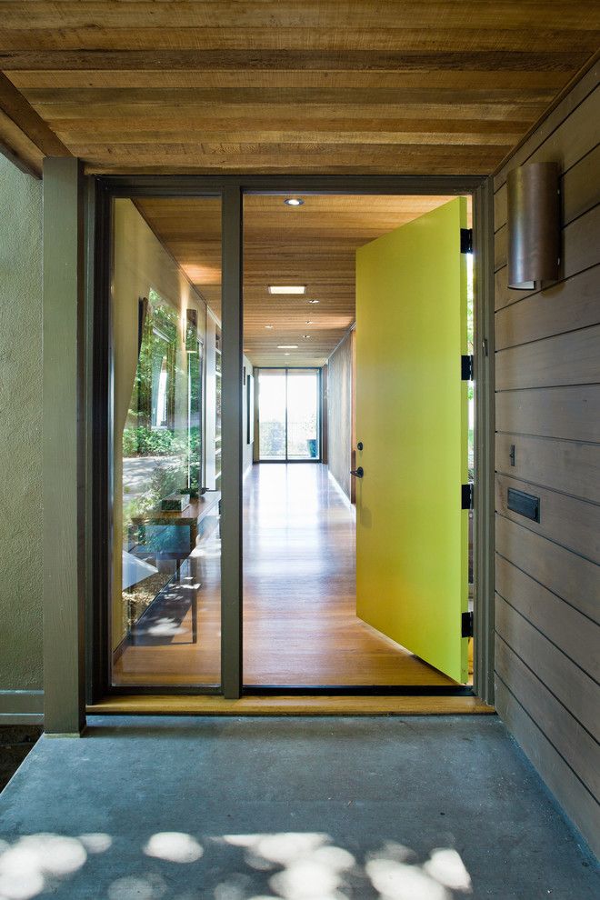 What Color is Chartreuse for a Modern Entry with a Glass and Mid Century Modern Renovation by Koch Architects, Inc.  Joanne Koch