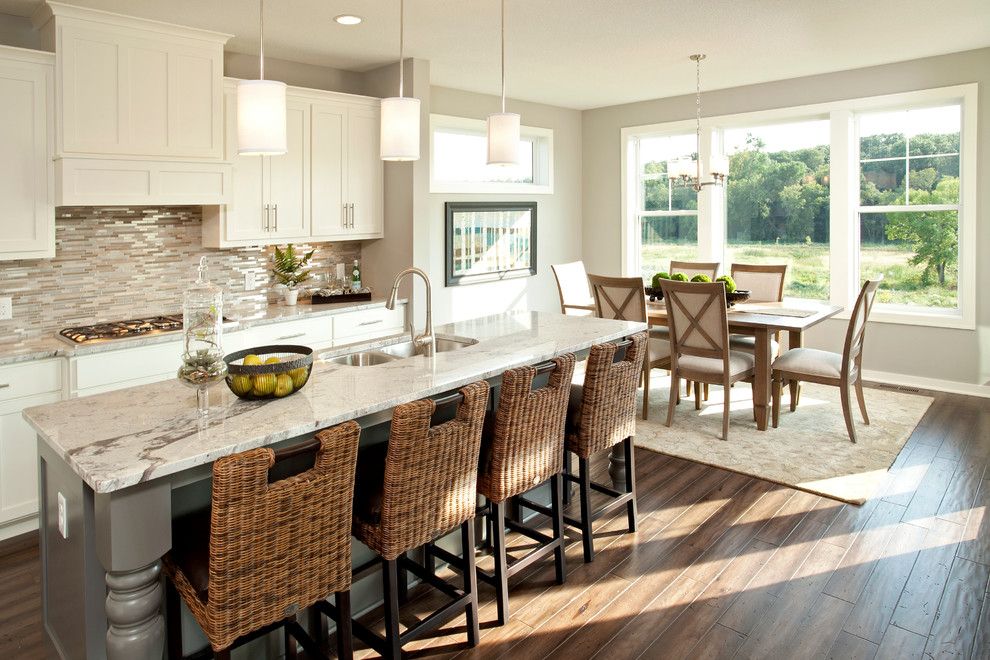 White Galaxy Granite for a Transitional Kitchen with a Sink in Center Island and the Broadmoor   Fall 2013 Parade of Homes Model by Robert Thomas Homes