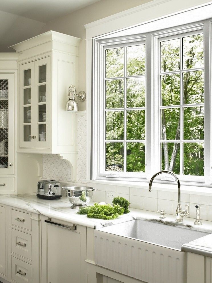 Whitehaus for a Traditional Kitchen with a White Kitchen and Kitchens by Glickman Design Build