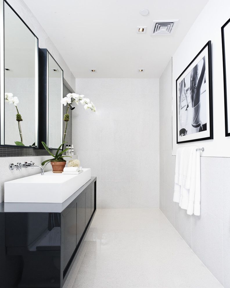 Whites Plumbing for a Contemporary Bathroom with a White Floor and Bathroom by D'apostrophe Design, Inc.