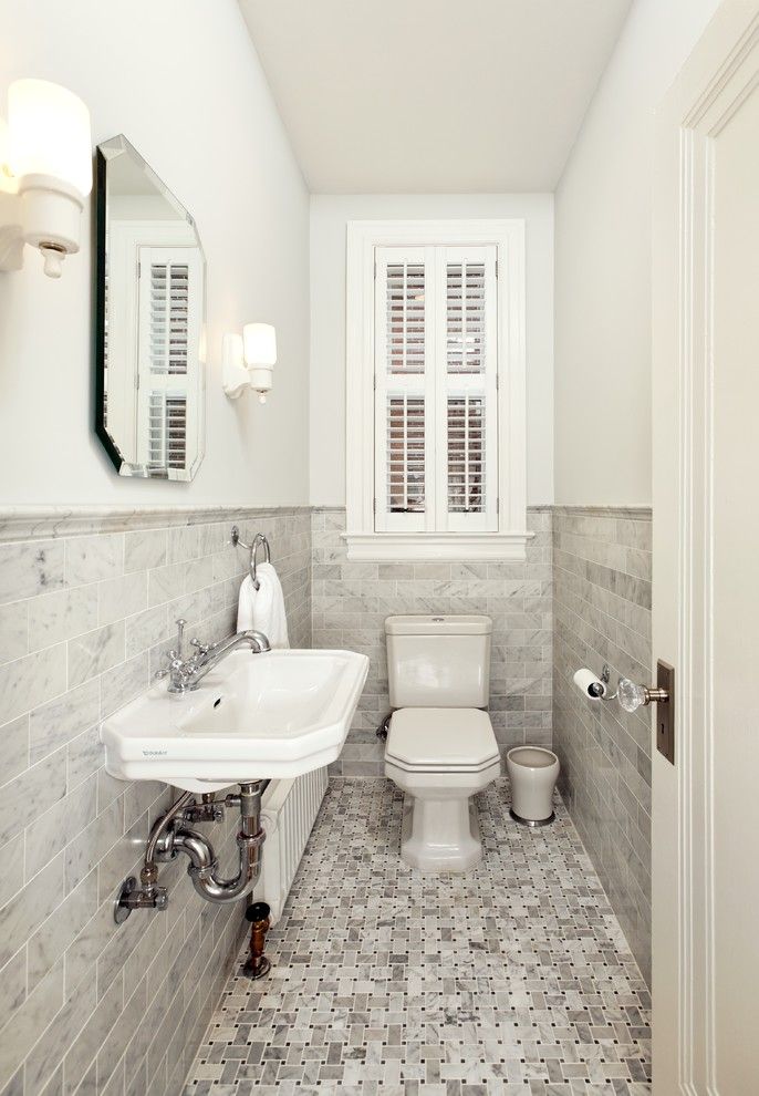 Whites Plumbing for a Victorian Powder Room with a Heater and Small Powder Bath by Four Brothers Llc