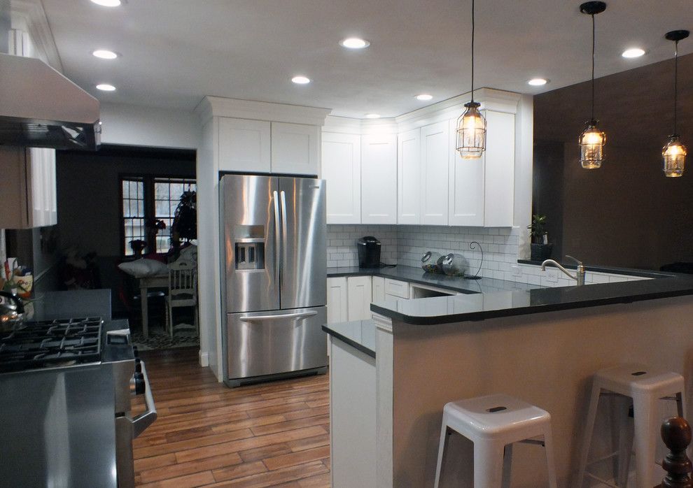 Wilke Window for a Contemporary Kitchen with a Pendant Lighting and Mid Continent Cabinetry by Norm's Bargain Barn