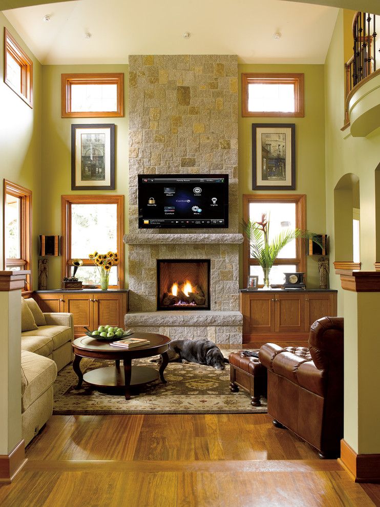 Wilson Parker Homes for a Craftsman Family Room with a Brick and Family Rooms by Magnolia Design Center