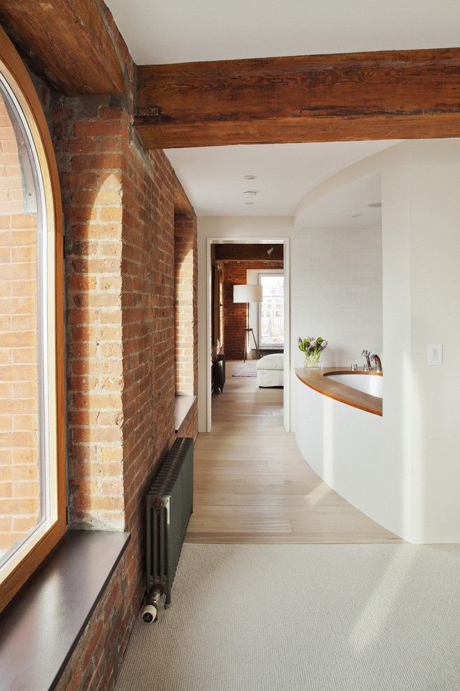 Window Sills for a Rustic Bathroom with a Loft and Hudson River Duplex Master Bath View by Mabbott Seidel Architecture