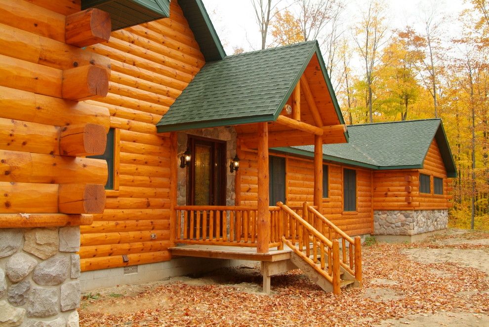 Woodhaven Lumber for a Rustic Exterior with a Log Siding and Cedar Half Log Siding by Woodhaven Log & Lumber