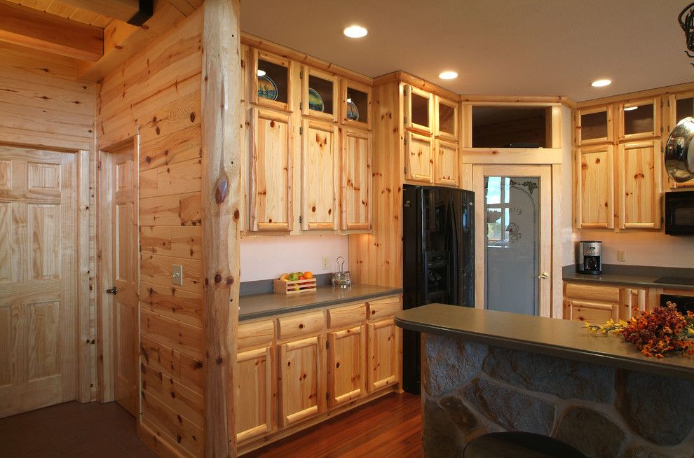 Woodhaven Lumber for a Rustic Kitchen with a Tongue and Groove Paneling and Knotty Pine Kitchen by Woodhaven Log & Lumber