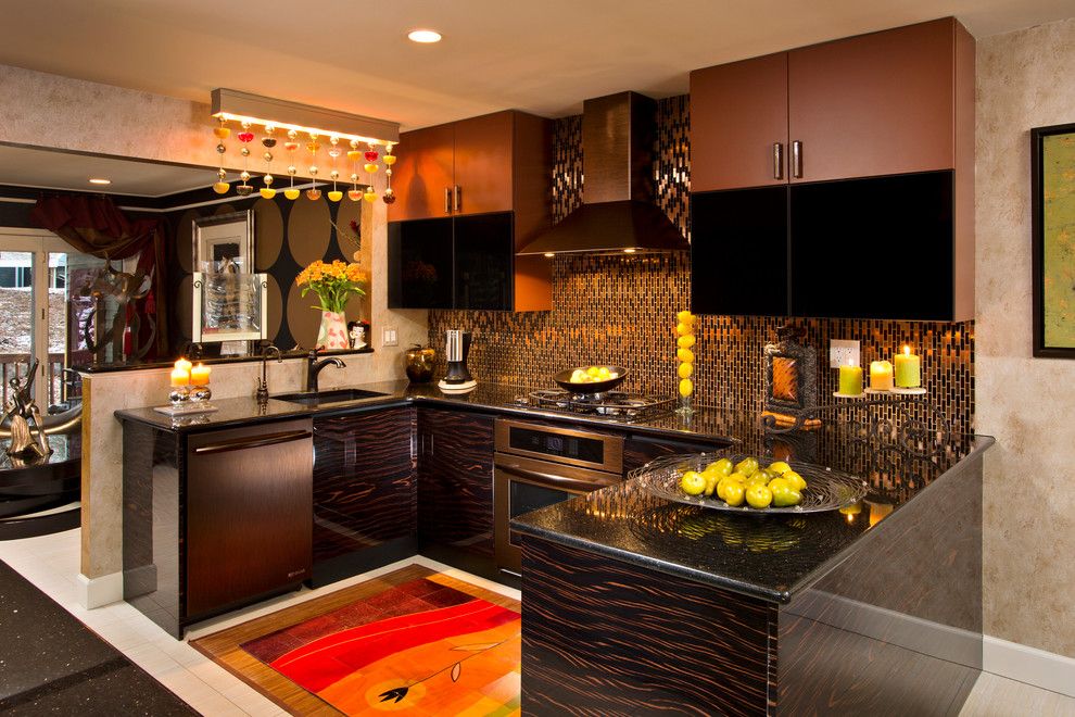 Woodland Cabinetry for a Eclectic Kitchen with a Metallic Tile and Glittering Heights by Teakwood Builders, Inc.