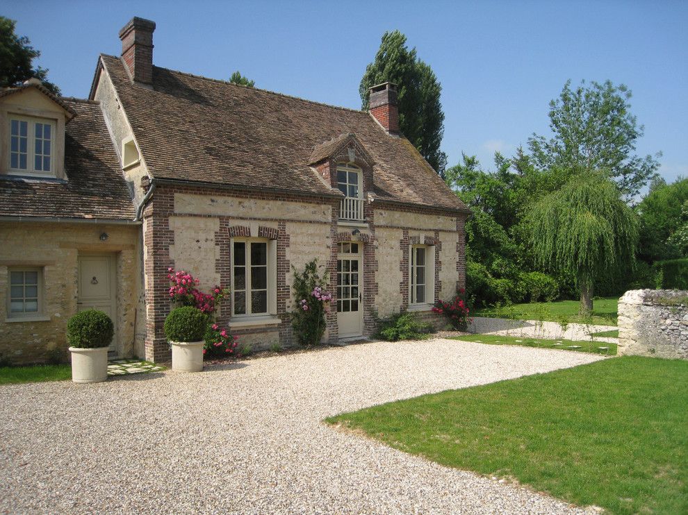 Wormald Homes for a Traditional Exterior with a Entrance and Normandy House by A+B Kasha Designs