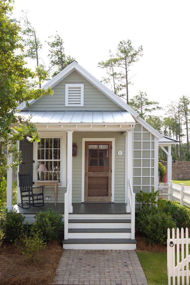 Wrap Around Porch House Plans for a Farmhouse Exterior with a Lap Siding and 228 Pendleton Road by Our Town Plans