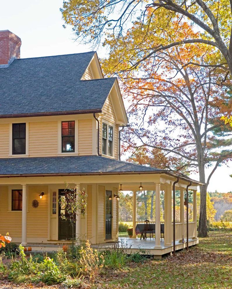 Wrap Around Porch House Plans for a Farmhouse Porch with a Yellow House and Lincoln Home by Sheldon Pennoyer Architects