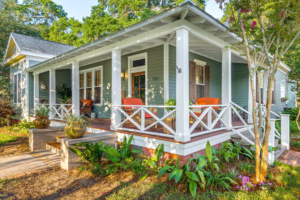 Wrap Around Porch House Plans for a Traditional Porch with a White Posts and Exteriors by Dalrymple | Sallis Architecture