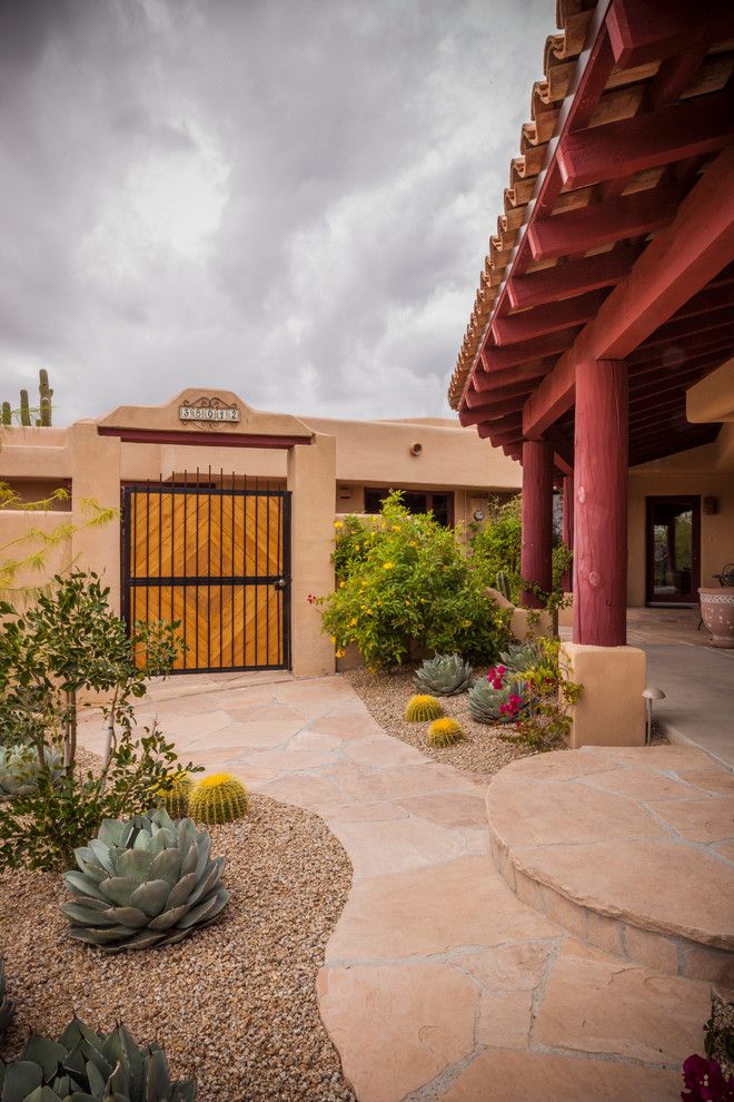 Xeriscape for a Southwestern Landscape with a Adobe Walls and Cave Creek Home in Arizona by Azul Verde Design Group, Inc.