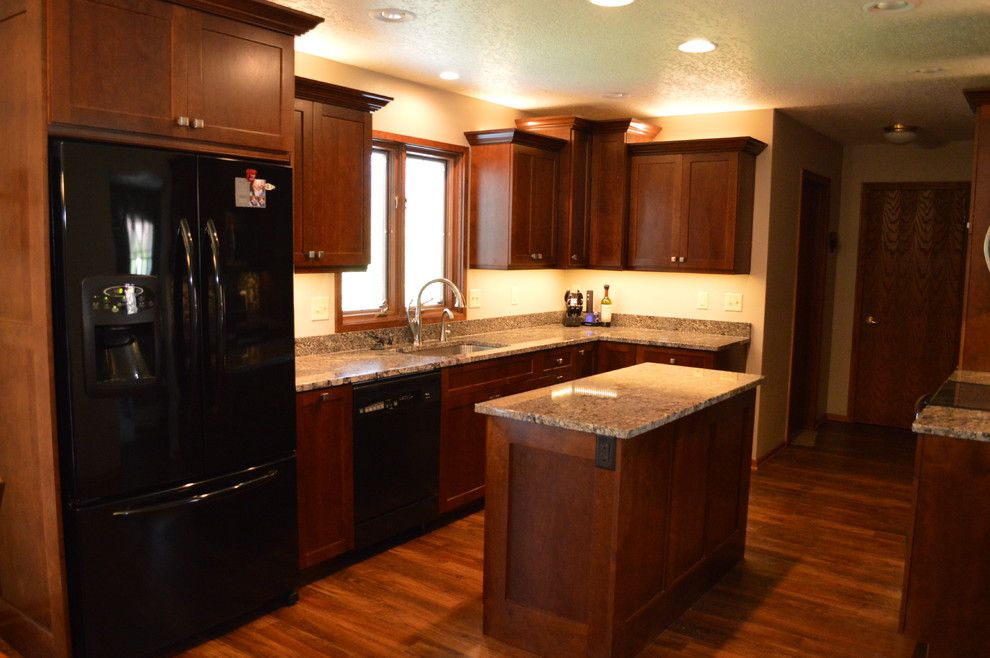 Adura for a Traditional Kitchen with a Custom Made Cherry Cabinetry and Custom Cherry  Kitchen Remodel by Oak Tree Homes