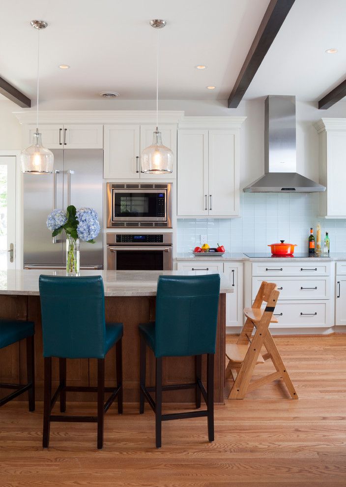 Ballard Hardware for a Farmhouse Kitchen with a Raised Roof and 1 Story Addition to a Farm Style House by Av Architects + Builders