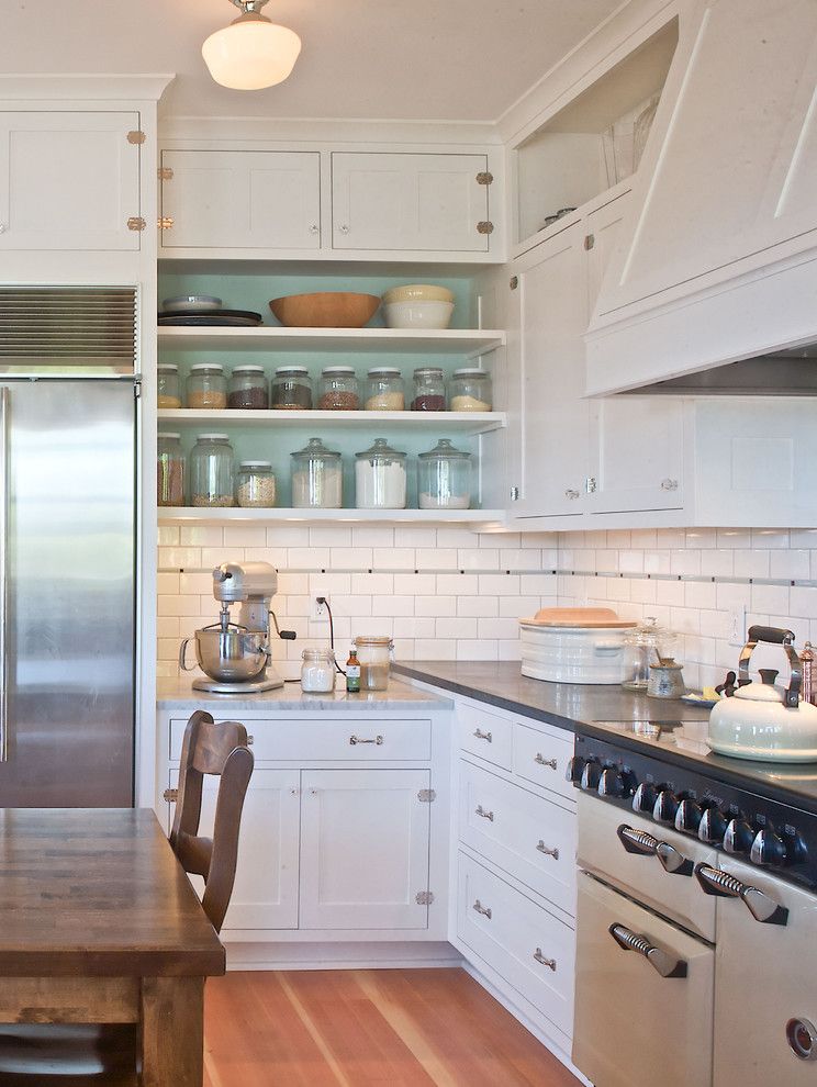 Ballard Hardware for a Traditional Kitchen with a White Kitchen and Ballard Farmhouse by Seattle Custom Cabinets