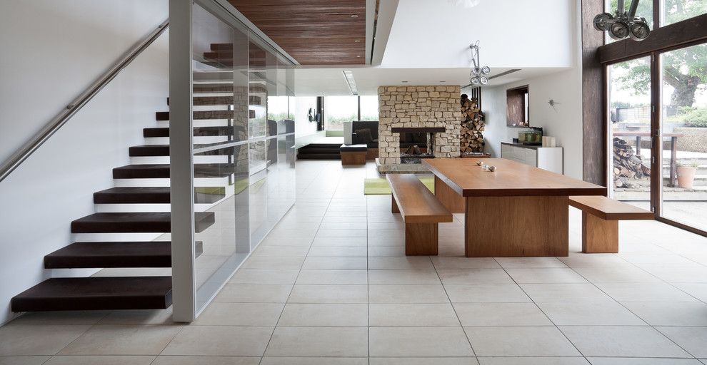 Bendheim Glass for a Contemporary Kitchen with a Glass Panel Staircase and the Long Barn by Nicolas Tye Architects