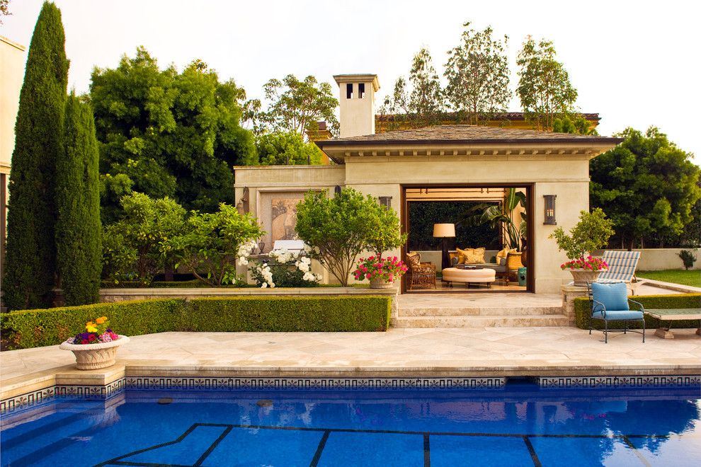 Brownlee Lighting for a Traditional Pool with a Backyard and Classic Traditional Residence by Harte Brownlee & Associates Interior Design