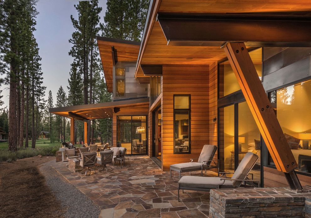 Capital Scrap Metal for a Contemporary Patio with a Wood Beam and Putter's Cabin by Ward Young Architecture & Planning   Truckee, Ca