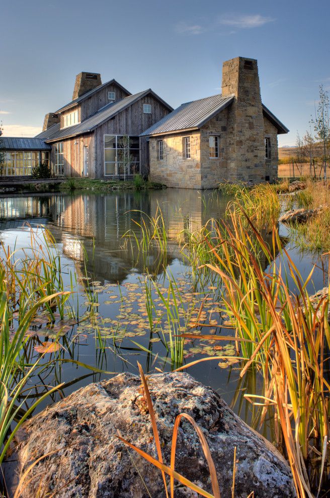 Capital Scrap Metal for a Traditional Landscape with a Lakeside and Fresh Meadows by Jlf & Associates, Inc.