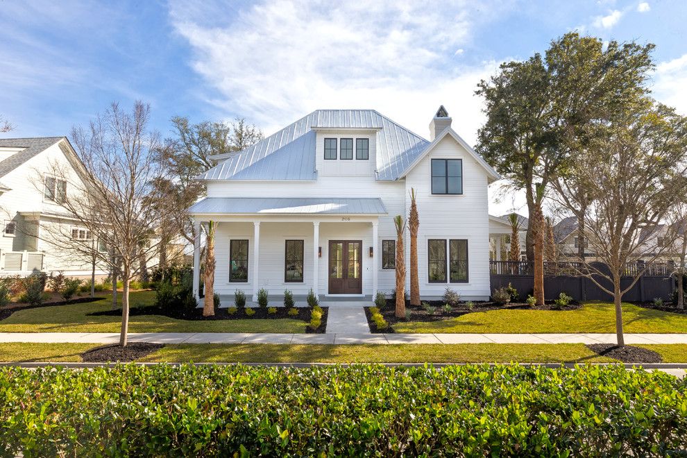 Charleston Forge for a Farmhouse Exterior with a White Exterior and Simmons Forge 1, Daniel Island, South Carolina by Shelter Custom Built Living