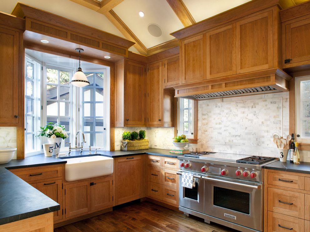 Cherrydale Hardware for a Traditional Kitchen with a Stove and Palo Alto Traditional by Scavullodesign Interiors