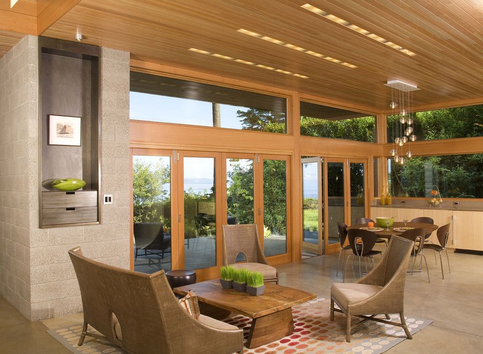 Cinder Block Wall for a Contemporary Living Room with a Open Floor Plan and Ellis Residence   Living Room by Coates Design Architects Seattle