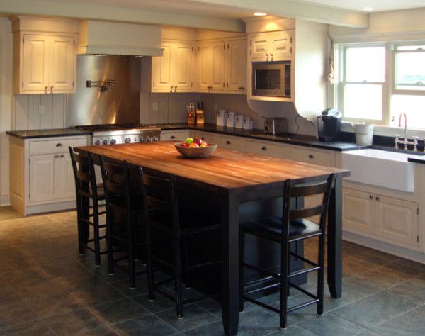 Cinder Block Wall for a Traditional Kitchen with a Kitchen Island and Vintage Farmhouse by Columbia Cabinets