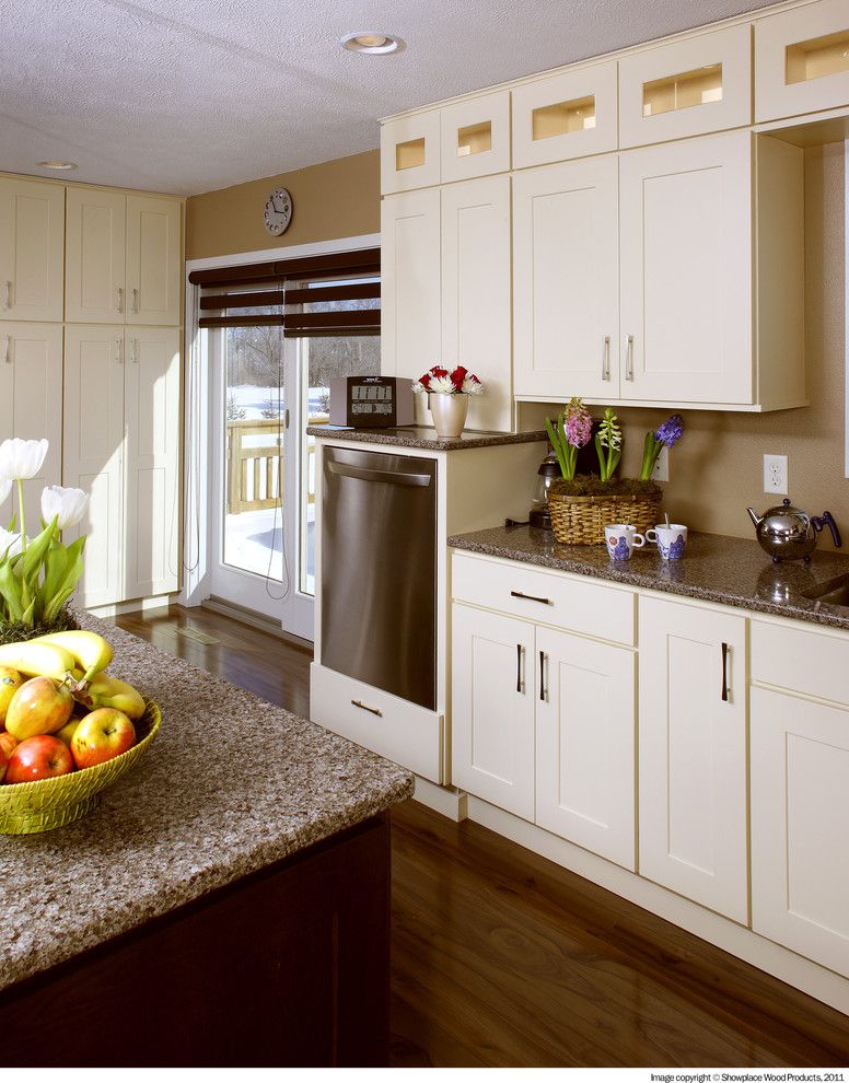 Cleaning Dishwasher with Vinegar for a Traditional Kitchen with a Island and Showplace Cabinets   Kitchen by Showplace Wood Products