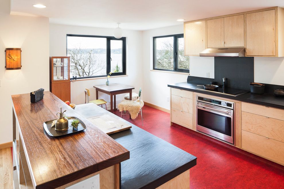 Forbo Flooring for a Modern Kitchen with a Yellow Chair and Modern Foursquare by Bicycle Homebuilding Company