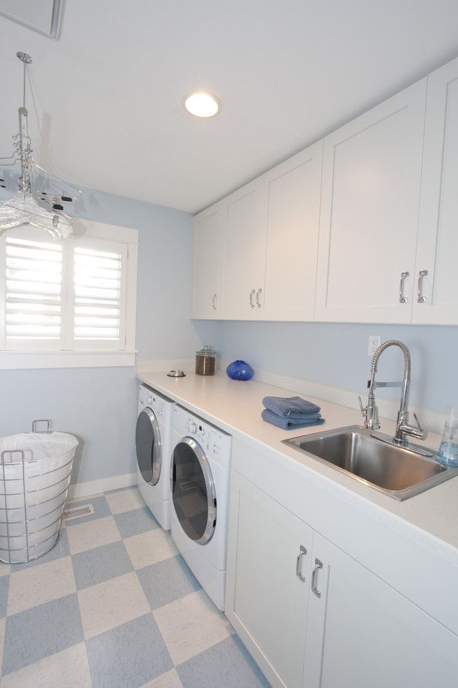 Forbo Flooring for a Traditional Laundry Room with a Harlequin Floor Pattern and Bright and Airy Whole House Remodel by the Neil Kelly Company