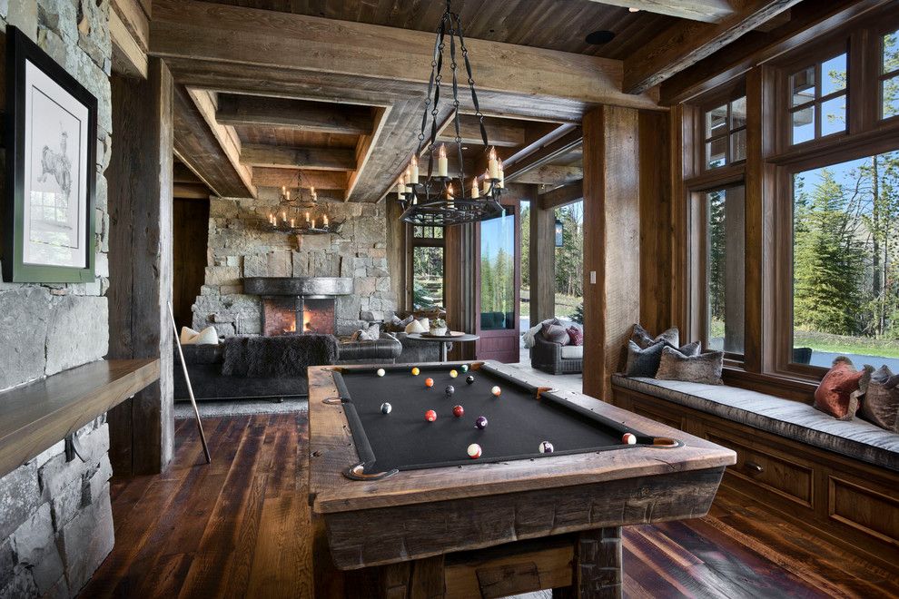 Golden West Billiards for a Rustic Family Room with a Game Room and Yellowstone Club Summit Residence by Locati Architects